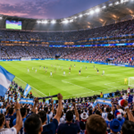 World Cup host country football stadium filled with supporters during an international tournament.